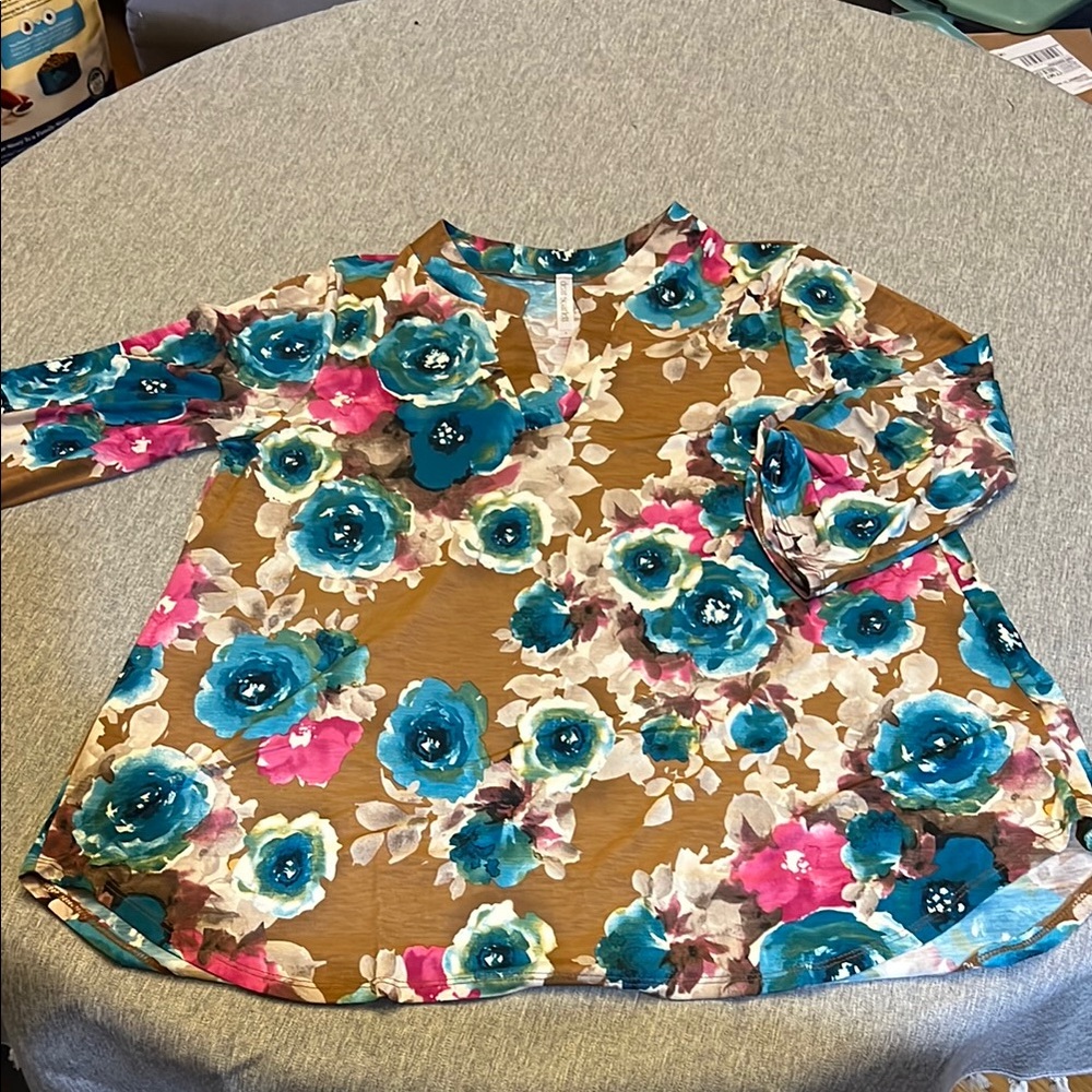 Blue and Pink Floral Blouse with Artistic Pattern